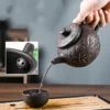 Hand Carved Lotus Black Mud Yixing Teapot